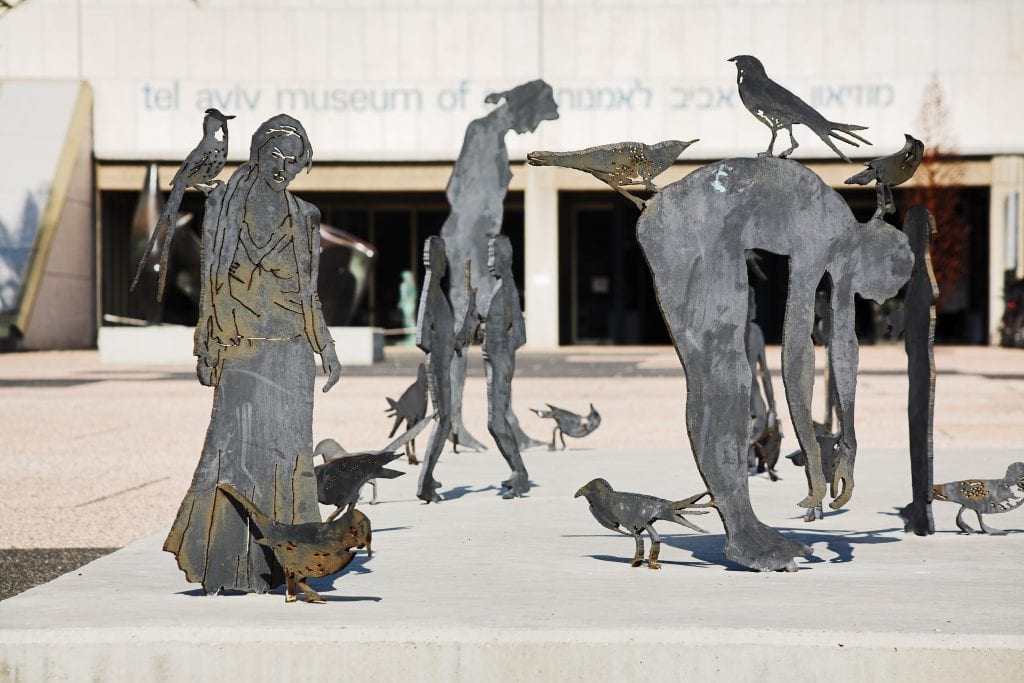 Sculptures of humans and birds